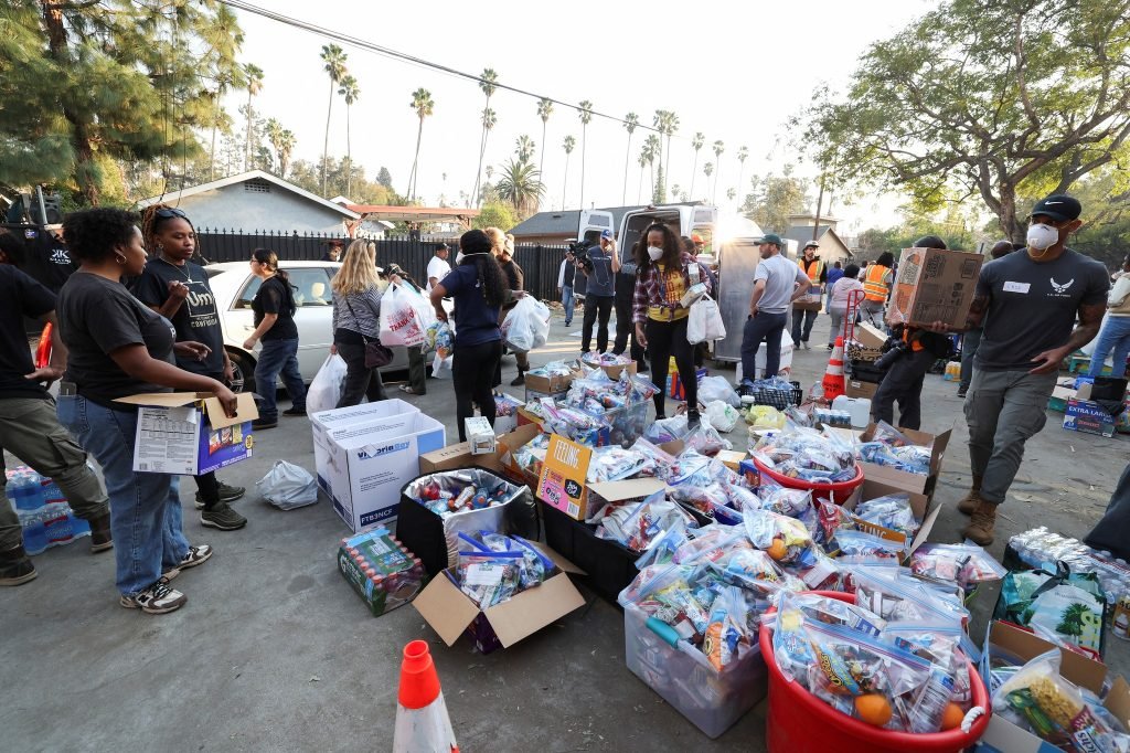 Volunteers help distribute food and supplies on Friday, January 10, for people affected by the Eaton fire in Pasadena, California.  Mario Anzuoni/Reut