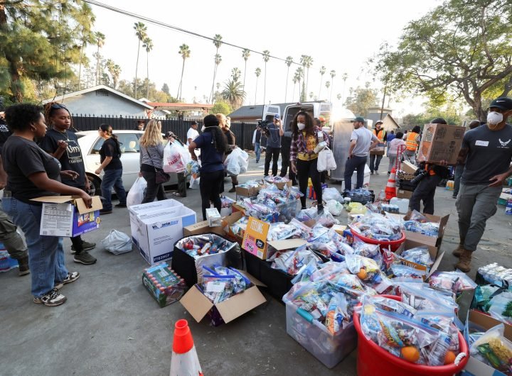 Volunteers help distribute food and supplies on Friday, January 10, for people affected by the Eaton fire in Pasadena, California.  Mario Anzuoni/Reut